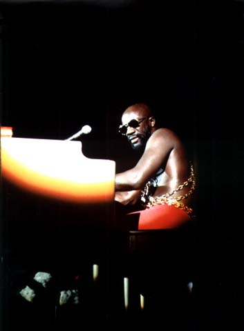 © John H. White, "Black soul singer Isaac Hayes performs at the International Amphitheater in Chicago as part of the annual PUSH [People United to Save Humanity] `Black Expo` in the fall of 1973," 1973