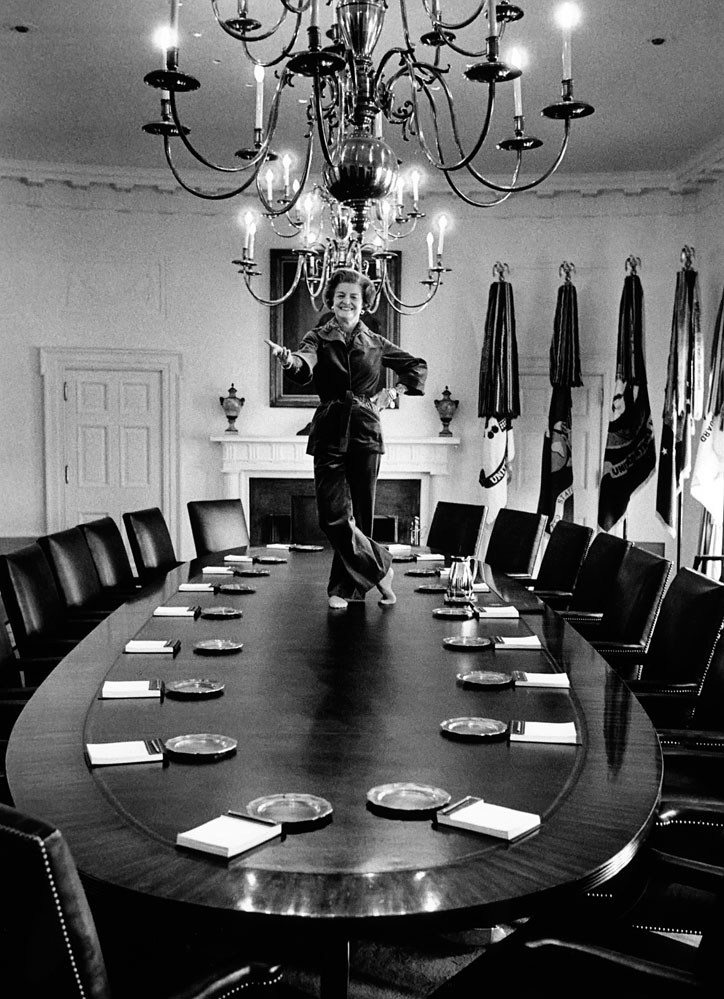 WASHINGTON -- JAN 19: "I've always wanted to dance on the Cabinet Room table," said First Lady Betty Ford as she poses atop it, January 19, 1977. Washington, DC, January 19, 1977, (Photo by David Hume Kennerly/GettyImages).