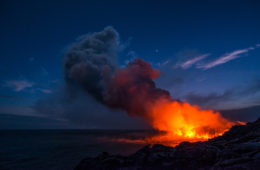 Watch Lava Meet the Ocean Under The Hawaiian Night Sky